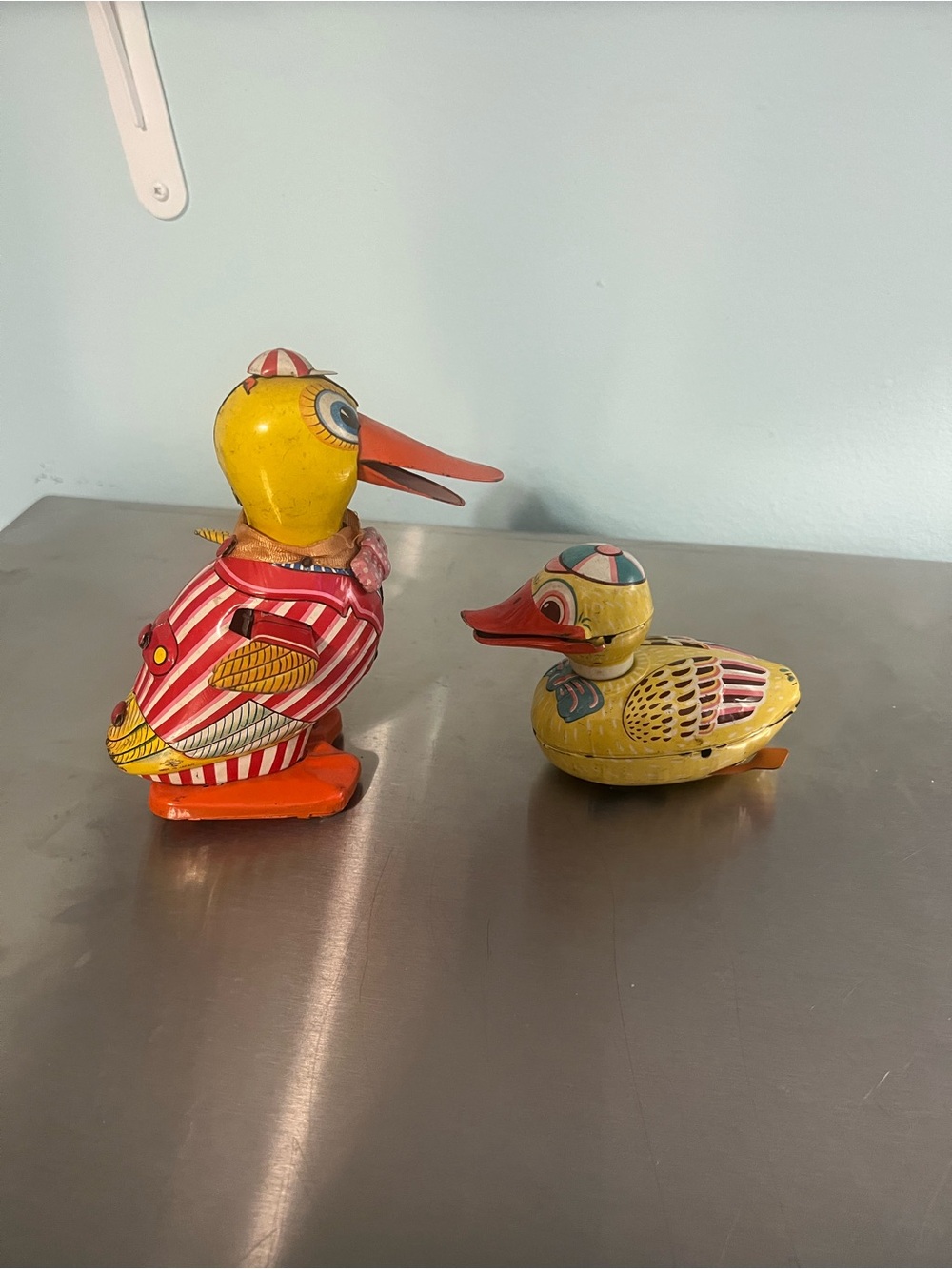 2 Yellow/Red Antique Japan Tin Toy Figurines